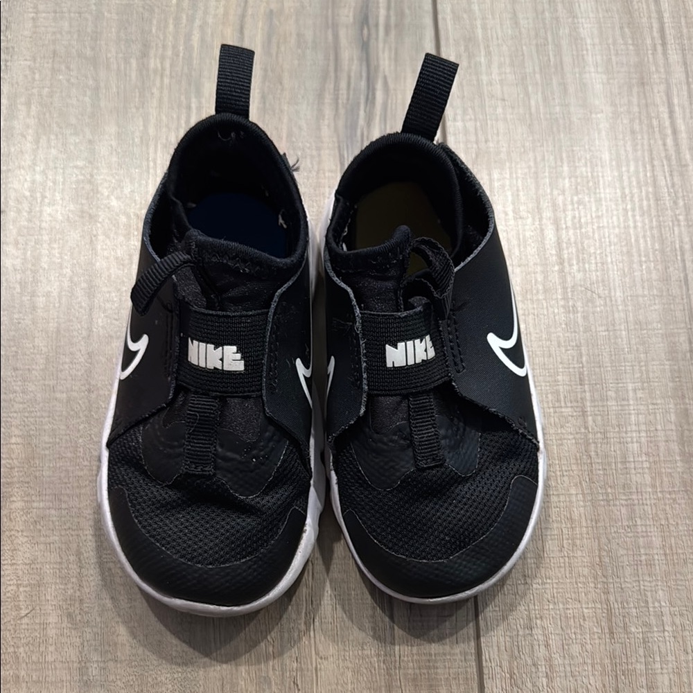 Nike Black Sneakers with Mesh Upper and Pull Tabs